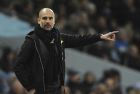 Manchester City's manager Pep Guardiola points during the English Premier League soccer match between Manchester City and Watford at Etihad stadium, in Manchester, England, Tuesday, Jan. 2, 2018. (AP Photo/Rui Vieira)