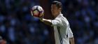 Real Madrid's Cristiano Ronaldo pushes the ball with his hand during the La Liga soccer match between Real Madrid and Atletico Madrid at the Santiago Bernabeu stadium in Madrid, Saturday, April 8, 2017. (AP Photo/Francisco Seco)