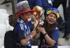 Japanese supporters hold a replica of the world cup as they celebrate after the group H match between Japan and Poland at the 2018 soccer World Cup at the Volgograd Arena in Volgograd, Russia, Thursday, June 28, 2018. Japan lost 1-0, but still qualified for the round of 16. (AP Photo/Darko Vojinovic)