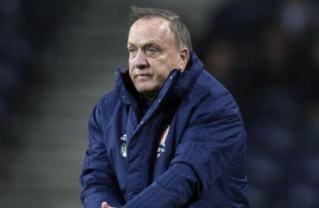 FILE - In this Thursday, Dec. 12, 2019 file photo, Feyenoord's head coach Dick Advocaat gestures during their Europa League group G soccer match against FC Porto at the Dragao stadium in Porto, Portugal. Veteran coach Dick Advocaat has extended his contract with Feyenoord by a year to keep him in charge of the Rotterdam club through next season, it was announced Tuesday, April 21, 2020. Feyenoord hired Advocaat in late October to succeed Jaap Stam, who resigned after less than half a season in charge and with the team struggling at 12th in the top flight Eredivisie.  (AP Photo/Miguel Angelo Pereira, file)