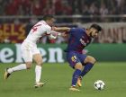 Barcelona's Andre Gomes, right, challenges Olympiacos' Omar Elabdellaoui during the Champions League group D soccer match between Olympiakos and Barcelona at Georgios Karaiskakis stadium at Piraeus port, near Athens, Tuesday, Oct. 31, 2017. (AP Photo/Petros Giannakouris)