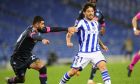FILE - Real Sociedad's David Silva, right, vies for the ball with Napoli's Elseid Hysaj during the Europa League group F soccer match between Real Sociedad and Napoli at the Anoeta stadium in San Sebastian, Spain, Thursday, Oct. 29, 2020. Real Sociedad can close the gap with the Spanish league's front-runners the weekend of 14-15 Jan. 2023, with Barcelona and Real Madrid playing the Spanish Super Cup in Saudi Arabia. (AP Photo/Amaia Zabalo, File)
