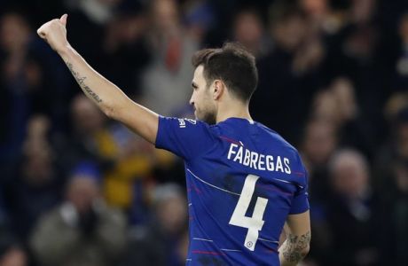 Chelsea's Cesc Fabregas gestures to the supporters at the end of the English FA Cup third round soccer match between Chelsea and Nottingham Forest at Stamford Bridge in London, Saturday, Jan. 5, 2019. Chelsea won 2-0. (AP Photo/Alastair Grant)