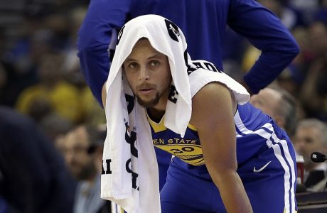 Golden State Warriors' Stephen Curry waits to enter an NBA basketball game against the Detroit Pistons, Sunday, Oct. 29, 2017, in Oakland, Calif. (AP Photo/Ben Margot)
