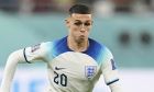 England's Phil Foden in action during the World Cup group B soccer match between England and Iran at the Khalifa International Stadium in Doha, Qatar, Monday, Nov. 21, 2022. (AP Photo/Abbie Parr)