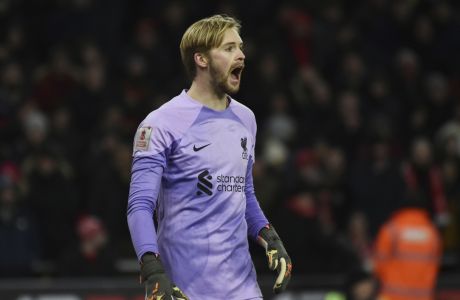 Liverpool's goalkeeper Caoimhin Kelleher reacts during the English FA Cup 3rd round replay soccer match between Wolverhampton Wanderers and Liverpool at Molineux stadium in Wolverhampton, England, Tuesday Jan. 17, 2023. (AP Photo/Rui Vieira)