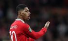 Manchester United's Marcus Rashford gestures during the English League Cup final soccer match between Manchester United and Newcastle United at Wembley Stadium in London, Sunday, Feb. 26, 2023. (AP Photo/Scott Heppell)