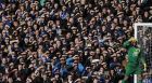 NOVEMBER 3:  Everton goalkeeper Tim Howard and spectators shield their eyes from the sun during their English Premier League soccer match against Tottenham Hotspur at Goodison Park in Liverpool, England. (Phil Noble/Reuters)