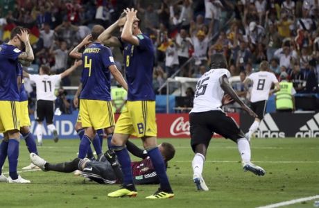 Sweden players reacts after Germany's Toni Kroos, right, scores his side's second goal during the group F match between Germany and Sweden at the 2018 soccer World Cup in the Fisht Stadium in Sochi, Russia, Saturday, June 23, 2018. (AP Photo/Thanassis Stavrakis)