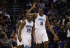 Charlotte Hornets guard Kemba Walker (15) and Bismack Biyombo (8) in the first half during an NBA basketball game against the Phoenix Suns, Sunday, Jan. 6, 2019, in Phoenix. (AP Photo/Rick Scuteri)