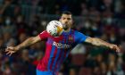 Barcelona's Sergio Aguero controls the ball during the Spanish La Liga soccer match between FC Barcelona and Valencia at the Camp Nou stadium in Barcelona, Spain, Sunday, Oct. 17, 2021. (AP Photo/Joan Monfort)