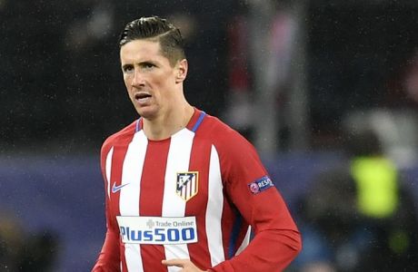 Atletico's Fernando Torres celebrates after scoring his side's fourth goal during the Champions League round of 16 first leg soccer match between Bayer Leverkusen and Atletico Madrid in Leverkusen, Germany, Tuesday, Feb. 21, 2017. (AP Photo/Martin Meissner)