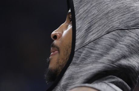 Houston Rockets' Carmelo Anthony watches during the first half of an NBA basketball game against the Indiana Pacers, Monday, Nov. 5, 2018, in Indianapolis. (AP Photo/Darron Cummings)
