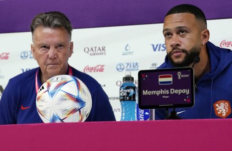 head coach Louis van Gaal of the Netherlands, left, and Memphis Depay, right, arrive at the venue of Netherlands official training on the eve of World Cup soccer match between Netherlands and Argentina in Doha, Qatar, Thursday, Dec. 8, 2022. (AP Photo/Eugene Hoshiko)