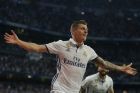 Real Madrid's Toni Kroos celebrates after scoring his side's fourth goal against Sevilla during the La Liga soccer match between Real Madrid and Sevilla at the Santiago Bernabeu stadium in Madrid, Sunday, May 14, 2017. Kroos scored once in Real Madrid's 4-1 victory. (AP Photo/Francisco Seco)