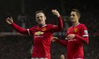 Manchester United's Wayne Rooney, left, celebrates with teammate Adnan Januzaj after scoring his second goal during the English Premier League soccer match between Manchester United and Sunderland at Old Trafford Stadium, Manchester, England, Saturday Feb. 28, 2015. (AP Photo/Jon Super)  