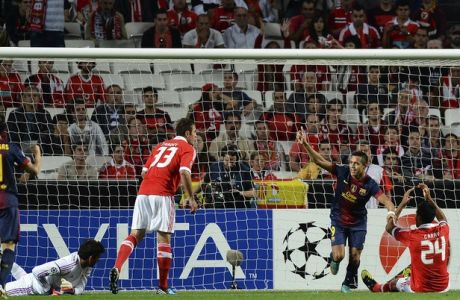 Barcelona's Chilean forward Alexis Sanchez (2ndR) celebrates after scoring during their UEFA Champions League group G football match Benfica vs FC Barcelona on October 2, 2012, at Luz Stadium in Lisbon.  AFP PHOTO/ FRANCISCO LEONG        (Photo credit should read FRANCISCO LEONG/AFP/GettyImages)