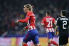 Atletico's Antoine Griezmann celebrates after Atletico's Thomas scored his side's opening goal during a Group C Champions League soccer match between Atletico Madrid and Qarabag at the Metropolitano stadium in Madrid, Spain, Tuesday, Oct. 31, 2017. (AP Photo/Paul White)