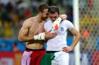 FORTALEZA, BRAZIL - JUNE 24:  Panagiotis Glykos and Vasilis Torosidis of Greece celebrate the 2-1 win after the 2014 FIFA World Cup Brazil Group C match between Greece and Cote D'Ivoire at Estadio Castelao on June 24, 2014 in Fortaleza, Brazil.  (Photo by Alex Livesey - FIFA/FIFA via Getty Images)