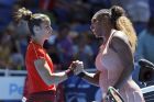 Serena Williams of the United States, right, shakes hands with Maria Sakkari of Greece at the net after winning their match, at the Hopman Cup in Perth, Australia, Monday, Dec. 31, 2018. (AP Photo/Trevor Collens)