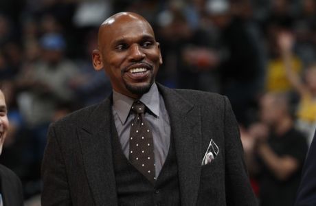 Memphis Grizzlies assistant coach Jerry Stackhouse in the first half of an NBA basketball game Monday, Dec. 10, 2018, in Denver. (AP Photo/David Zalubowski)
