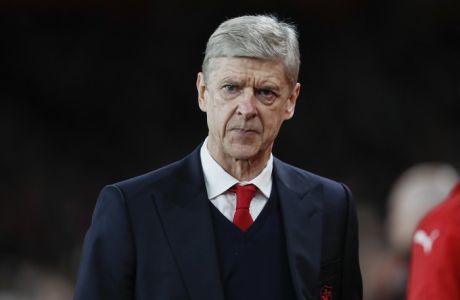 Arsenal manager Arsene Wenger stands prior to the start of the Champions League round of 16 second leg soccer match between Arsenal and Bayern Munich at the Emirates Stadium in London, Tuesday, March 7, 2017. (AP Photo/Kirsty Wigglesworth)
