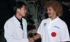 Colombian soccer star Carlos Valderrama, right, shakes hands with Kazuyoshi Miura of Japan, during a reception on Tuesday, Aug. 29, 1995, at a Tokyo Hotel for Wednesday's FIFA all-star charity soccer match.  The event will raise money for Kobe earthquake sufferers.    Valderrama plays for the Pan-American all-stars team and Miura plays for the rest of the World stars team. (AP Photo/Atsushi Tsukada)