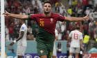 Portugal's Goncalo Ramos celebrates after scoring his side's fifth goal during the World Cup round of 16 soccer match between Portugal and Switzerland, at the Lusail Stadium in Lusail, Qatar, Tuesday, Dec. 6, 2022. (AP Photo/Alessandra Tarantino)