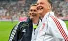 FILE - In this Friday, Aug. 13, 2010 file photo, the then  Bayern Munich head coach Louis van Gaal, right, and the then Real Madrid's head coach Jose Mourinho as they smile prior to the friendly soccer match between FC Bayern Munich and Real Madrid in Munich, southern Germany. Former Manchester United, Barcelona, Bayern and Netherlands coach Louis van Gaal may never return to coaching. The 65-year-old Dutchman has not led a team since being fired by Manchester United in May. (AP Photo/Kerstin Joensson, File)