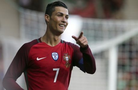 Portugals Cristiano Ronaldo gestures during the international friendly soccer match between Portugal and Sweden at the dos Barreiros stadium in Funchal, Madeira island, Portugal, Tuesday, March 28 2017. (AP Photo/Armando Franca)