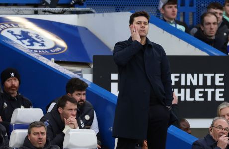 Chelsea's head coach Mauricio Pochettino watches his side play from the sideline during the English Premier League soccer match between Chelsea and Wolverhampton Wanderers at Stamford Bridge stadium in London, Sunday, Feb. 4, 2024. (AP Photo/Ian Walton)