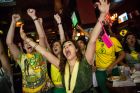 NEW YORK, NY - JUNE 12:  Angela Stewart (C), a Brazilian soccer fan originally from Rio de Janeiro, Brazil,  celebrates after a Brazilian goal in the Brazil vs. Croatia World Cup game at Legends Bar on June 12, 2014 in New York City. Brazil vs Croatia is the first game of the World Cup, which will take place throughout Brazil until Sunday, July 13.  (Photo by Andrew Burton/Getty Images)
