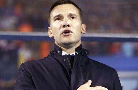 Ukraine's head coach Andriy Shevchenko sings the national anthem ahead of the World Cup Group I qualifying soccer match between Croatia and Ukraine, at Maksimir stadium in Zagreb, Croatia, Friday, March 24, 2017. (AP Photo/Darko Bandic)