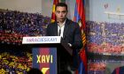 FC Barcelona Xavi Hernandez speaks  during  his farewell event at the Camp Nou stadium in Barcelona, Spain, Wednesday, June 3, 2015. FC Barcelona midfielder Xavi Hernandez says he will leave the Catalan club after 17 trophy-laden seasons in which he set club records for appearances and titles won. The 35-year-old Xavi says he will cut his contract short by one year and leave after this season to go play for Qatari club Al-Sadd on a two-year contract. (AP Photo/Manu Fernandez)