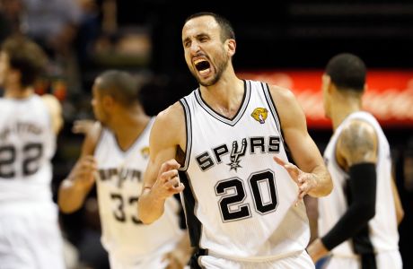 Manu Ginobili of the San Antonio Spurs reacts after making a basket in the third quarter against the Miami Heat during Game Five of the 2013 NBA Finals in San Antonio, Texas.