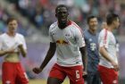 Leipzig's Ibrahima Konate reats during the German Bundesliga soccer match between Leipzig and Bayern Munich at the Red Bull Arena stadium in Leipzig, Germany, Saturday, May 11, 2019. (AP Photo/Michael Probst)