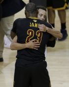 Cleveland Cavaliers forward LeBron James (23) hugs Golden State Warriors guard Stephen Curry after Game 5 of basketball's NBA Finals in Oakland, Calif., Monday, June 12, 2017. The Warriors won 129-120 to win the NBA championship. (AP Photo/Ben Margot)