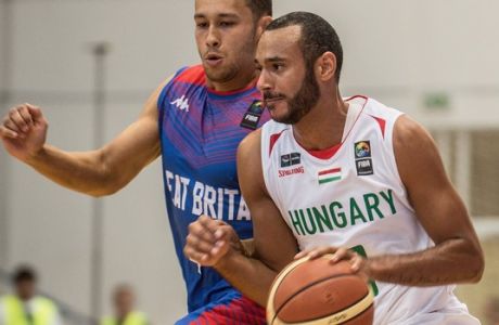 Adam Hanga of Hungary, right, and Andrew Lawrence of Great Britain in action during their men's basketball European Championship Group G qualifying first round first leg match in Kecskemet, 85 kms southeast of Budapest, Hungary, Wednesday, Aug. 31, 2016. (Sandor Ujvari/MTI via AP)