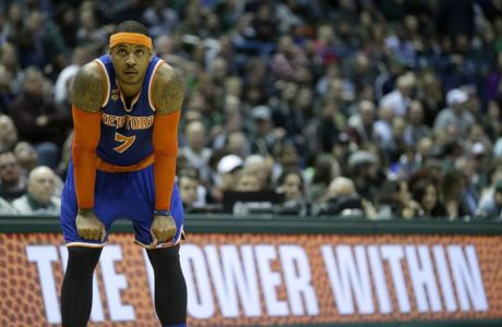 New York Knicks' Carmelo Anthony watches a free throw during the second half of an NBA basketball game against the Milwaukee Bucks Wednesday, March 8, 2017, in Milwaukee. (AP Photo/Aaron Gash) 