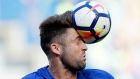 Chelsea's Gary Cahill heads the ball during the English Premier League soccer match between Chelsea and Liverpool at Stamford Bridge stadium in London, Sunday, May 6, 2018. (AP Photo/Kirsty Wigglesworth)