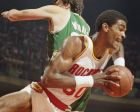 Houston Rockets Ralph Sampson (50) takes control of a loose ball as Boston Celtics Kevin McHale missed during the third game of the NBA Championship in Houston on Sunday, June 2, 1986. (AP Photo/EA)