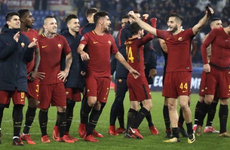 Roma players celebrate their victory at the end of the group C Champions League soccer match between Roma and Qarabag at the Stadio Olimpico in Rome, Italy, Tuesday, Dec. 5, 2017. (AP Photo/Alessandra Tarantino)