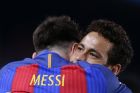 FC Barcelona's Lionel Messi, left, is embraced by team mate Neymar as they celebrate after scoring a goal during the Spanish La Liga soccer match between FC Barcelona and Valencia at the Camp Nou stadium in Barcelona, Spain, Sunday, March 19, 2017. (AP Photo/Manu Fernandez)