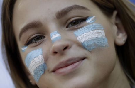 An Argentina fan smiles prior to the group D match between Argentina and Iceland at the 2018 soccer World Cup in the Spartak Stadium in Moscow, Russia, Saturday, June 16, 2018. (AP Photo/Matthias Schrader)