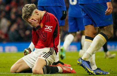Manchester United's Alejandro Garnacho reacts after missing a chance to score during the English Premier League soccer match between Manchester United and Chelsea at Old Trafford stadium in Manchester, England, Wednesday, Dec. 6, 2023. (AP Photo/Dave Thompson)