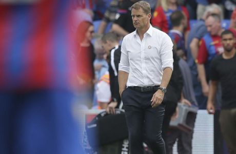 Crystal Palace's manager Frank de Boer looks walks onto the pitch after the English Premier League soccer match between Crystal Palace and Swansea City at Selhurst Park in London, Saturday Aug. 26, 2017. (AP Photo/Tim Ireland)