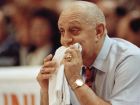 FILE - In this April 2, 1990, file photo, UNLV coach Jerry Tarkanian chews on his towel while watching his Runnin' Rebels take onr Duke University in the championship game of the Final Four in Denver.  (AP Photo/Ed Reinke, File)