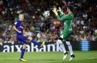 FC Barcelona's Andres Iniesta, left, kicks the ball during the Joan Gamper trophy friendly soccer match between FC Barcelona and Chapecoense at the Camp Nou stadium in Barcelona, Spain, Monday, Aug. 7, 2017. (AP Photo/Manu Fernandez)
