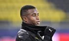 Dortmund's Youssoufa Moukoko prepares prior the Champions League group F soccer match between Borussia Dortmund and Club Brugge in Dortmund, Germany, Tuesday, Nov. 24, 2020. (AP Photo/Martin Meissner)