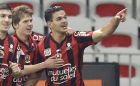 Nice's Hatem Ben Arfa, right, reacts with his teammates Nice's Vincent Koziello, center  and Jeremy Pied after scoring the first goal against Lorient during their French League One soccer match, Saturday, Jan. 23, 2016, in Nice stadium, southeastern France. (AP Photo/Lionel Cironneau)